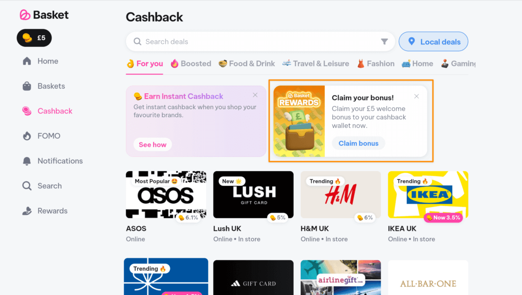 Screenshot of TryBasket app showing £5 credit in Rewards section and active gift card cashback offers.